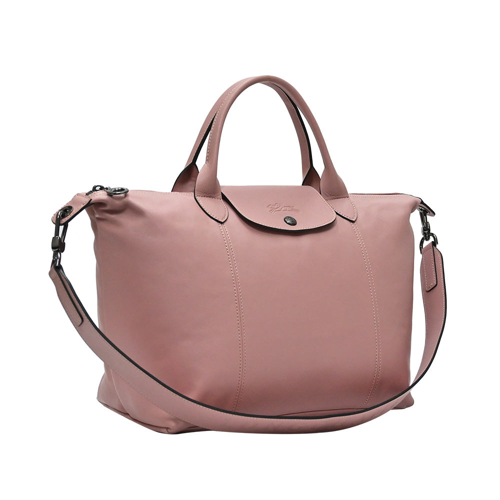 Longchamp Le Pliage Cuir Medium Top Handle Bag in Antique Pink, Women's  Fashion, Bags & Wallets, Tote Bags on Carousell
